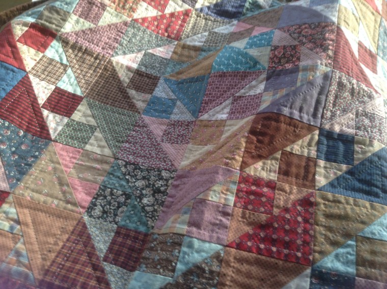 3.   Shade four patch blog set as a barn raising, also at the quilt meetings show and tell.